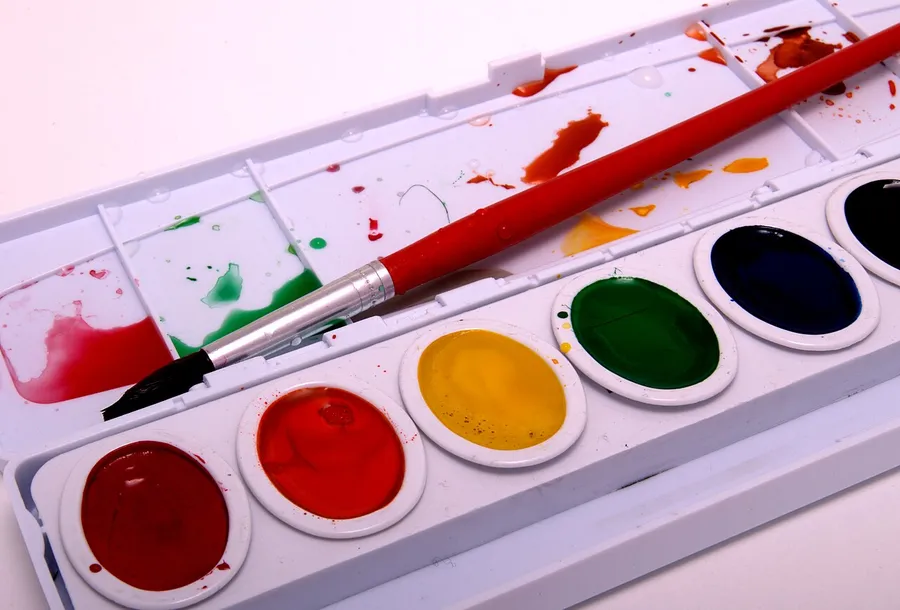 A watercolour paint set showing many tints and shades of colour