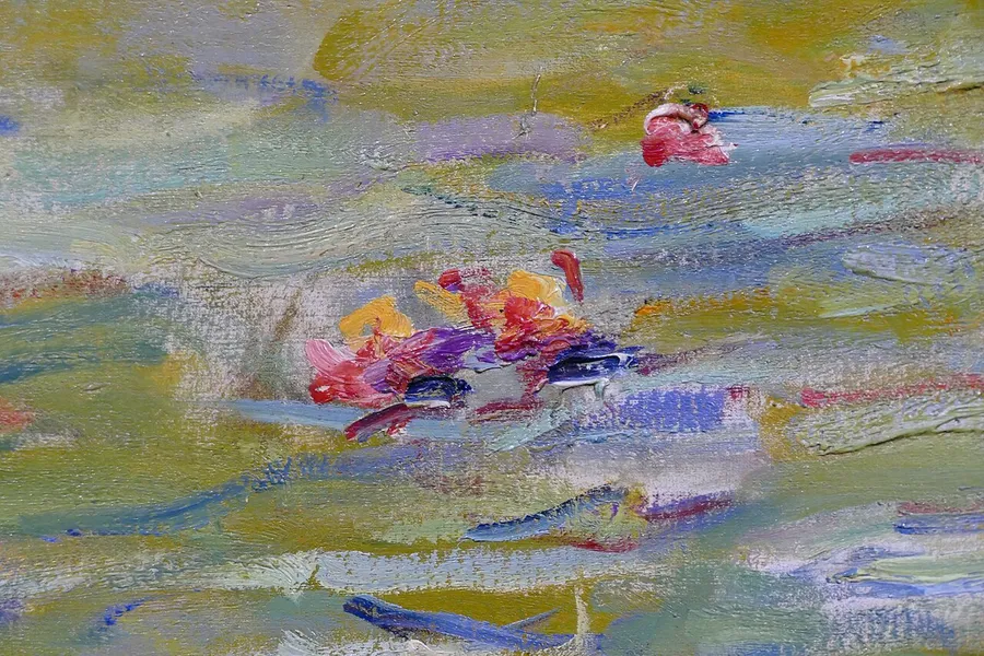 Claude Monet's dreamy Water Lilies painted in soft Impressionist dabs