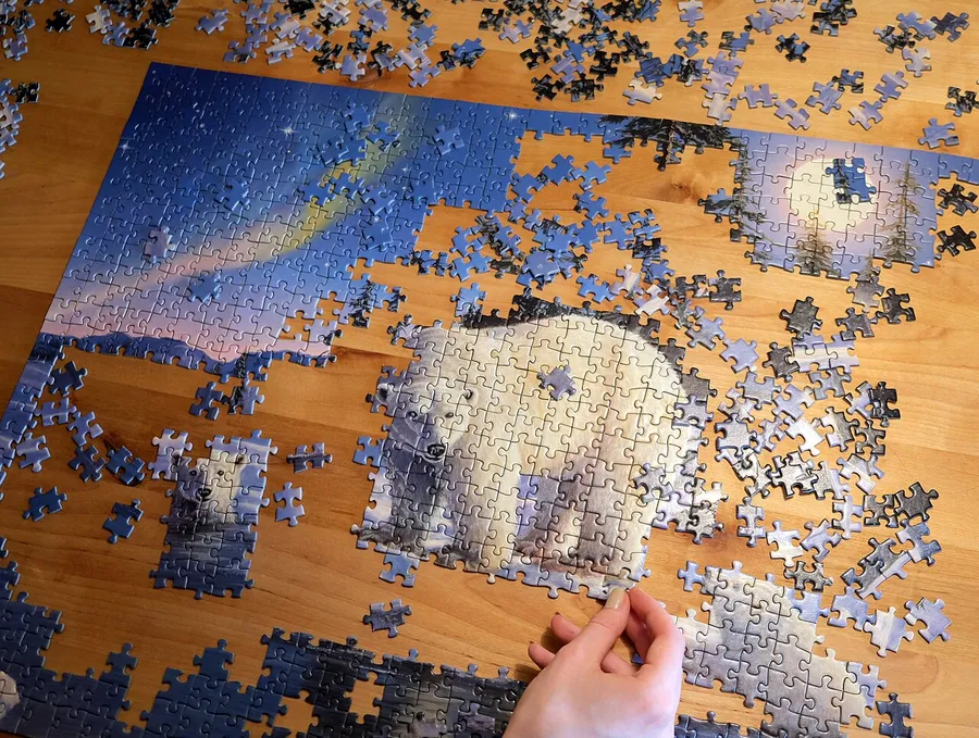 A child reading and solving puzzles to give the brain a workout