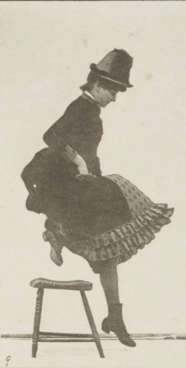 A child running and jumping outdoors, showing an action