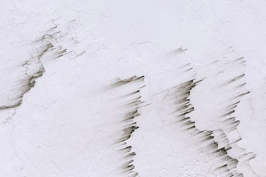A frozen Arctic tundra landscape in the cold polar zone