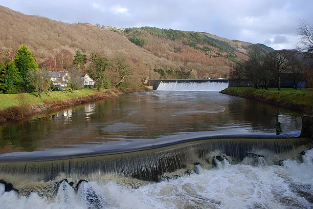 A large hydroelectric dam with water rushing through it