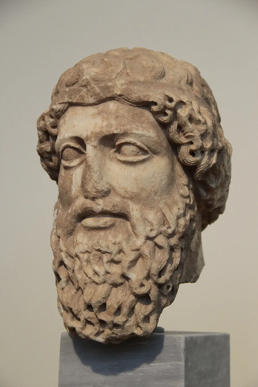 A marble statue of a Greek god from ancient Greece