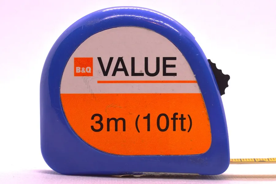An extended tape measure showing metres and centimetres