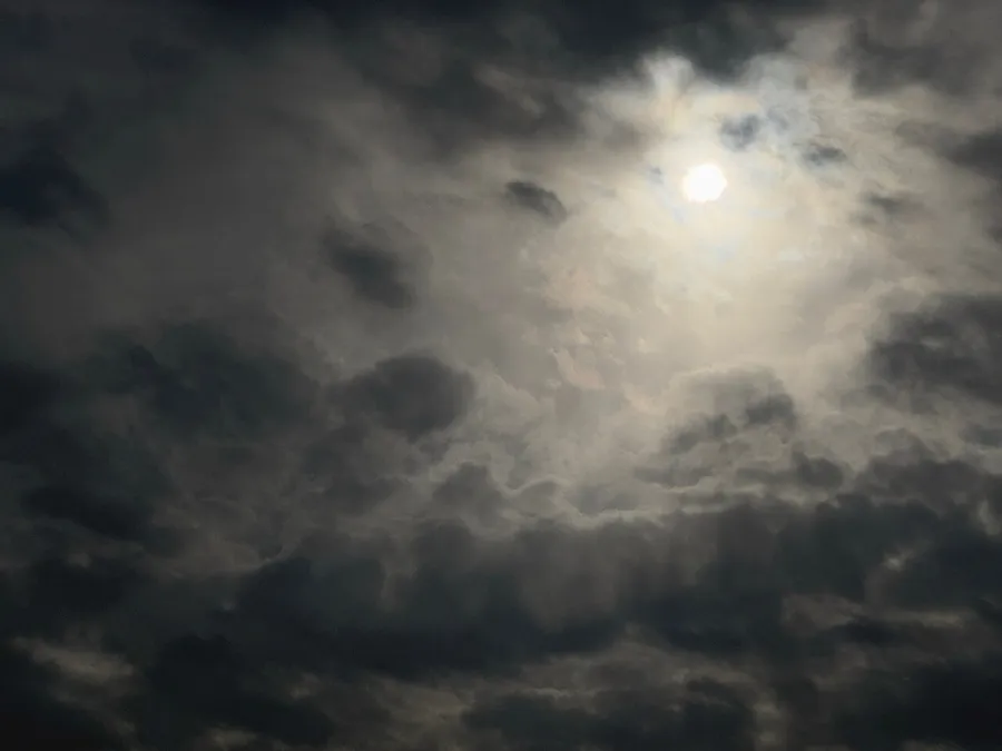 The Sun shining brightly, sending heat to Earth by radiation