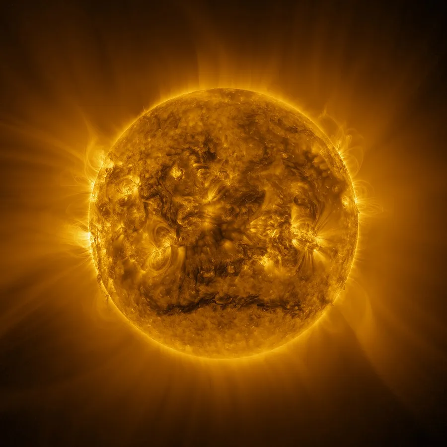 The blazing surface of the Sun glowing with fiery yellow and orange