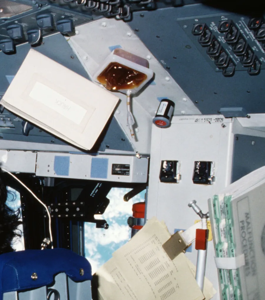An astronaut drifting weightlessly aboard the space station