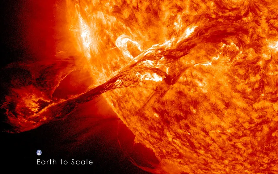 The enormous Sun shown beside the tiny Earth for size